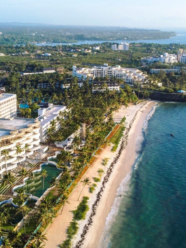Drone shot over the Beach of the Coastal part of Mombasa, Kenya at sunrise